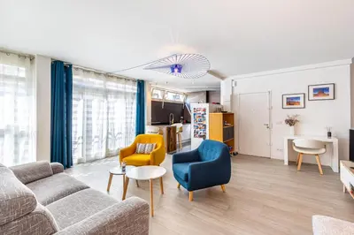 Coin salon dans l'établissement GuestReady - Appartement Lumineux au 15ème