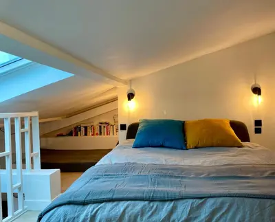 Un ou plusieurs lits dans un hébergement de l'établissement Le Monceau - Charmant appartement mezzanine Paris