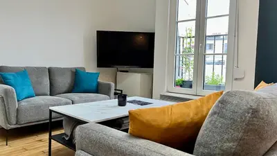 Télévision ou salle de divertissement dans l'établissement Le Monceau - Charmant appartement mezzanine Paris