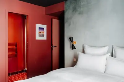 Un ou plusieurs lits dans un hébergement de l'établissement Edgar Suites Tour Eiffel - Carrières