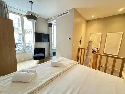 Un ou plusieurs lits dans un hébergement de l'établissement Apartment 60 m2 xx Center of Paris xx 2 Bedrooms & 2 Bathrooms