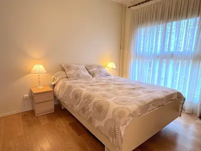 Un ou plusieurs lits dans un hébergement de l'établissement L'appartement Leclerc