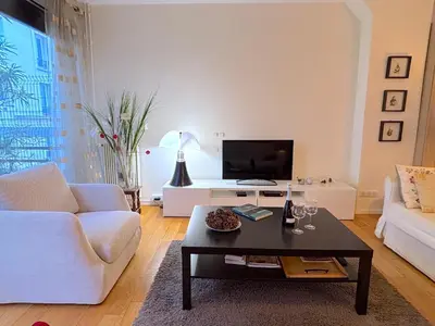 Télévision ou salle de divertissement dans l'établissement L'appartement Leclerc