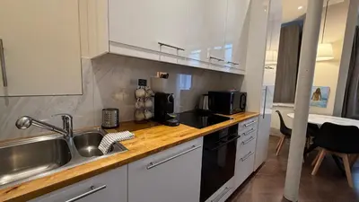 Cuisine ou kitchenette dans l'établissement Monceau-Levis, rue Lebouteux - 6 people