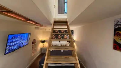 Télévision ou salle de divertissement dans l'établissement Monceau-Levis, rue Lebouteux - 6 people