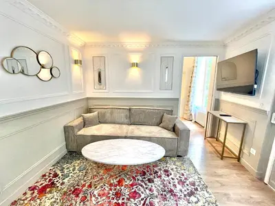 Coin salon dans l'établissement Suite Adèle Passy