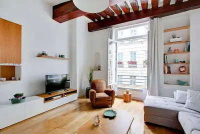 Coin salon dans l'établissement Unforgettable Stay in the Heart of Paris