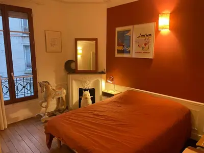 Un ou plusieurs lits dans un hébergement de l'établissement Montmartre // Lovely flat for you !