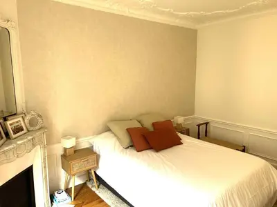 Un ou plusieurs lits dans un hébergement de l'établissement Montmartre // Lovely flat for you !