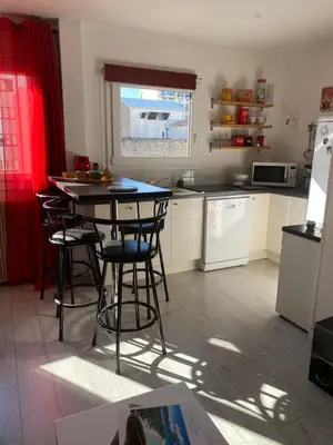 Cuisine ou kitchenette dans l'établissement Joli appartement