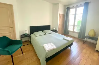 Un ou plusieurs lits dans un hébergement de l'établissement GUSTAVE - Charming Eiffel Tower Appartement -