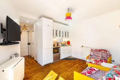 Cuisine ou kitchenette dans l'établissement GuestReady - Charm Central in the 14th
