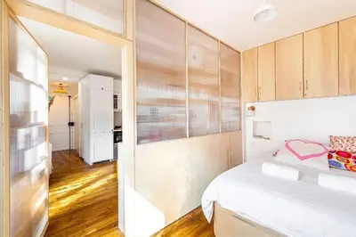 Un ou plusieurs lits dans un hébergement de l'établissement GuestReady - Charm Central in the 14th