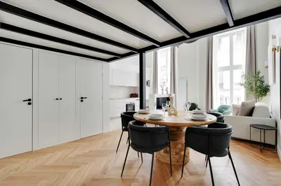 Coin salon dans l'établissement Cozy apartment - 1BR-4P - Place des Victoires