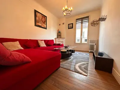 Coin salon dans l'établissement Grand Appt' * Cosy * Proche Paris