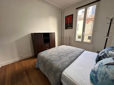 Un ou plusieurs lits dans un hébergement de l'établissement Grand Appt' * Cosy * Proche Paris