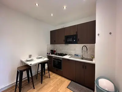 Cuisine ou kitchenette dans l'établissement Grand Appt' * Cosy * Proche Paris