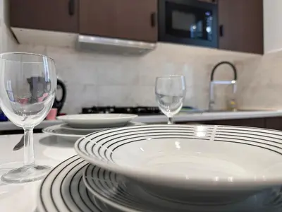 Cuisine ou kitchenette dans l'établissement Grand Appt' * Cosy * Proche Paris