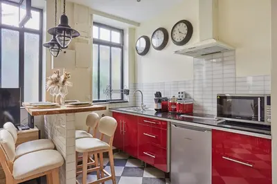 Cuisine ou kitchenette dans l'établissement Apartment Center of Paris by Studio prestige