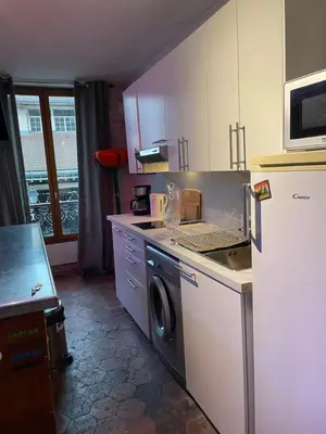 Cuisine ou kitchenette dans l'établissement La Thipique