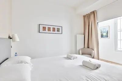Un ou plusieurs lits dans un hébergement de l'établissement Marais Elegance Suite - Two bedrooms