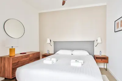 Un ou plusieurs lits dans un hébergement de l'établissement Marais Elegance Suite - Two bedrooms