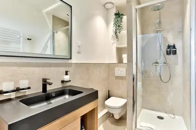Salle de bains dans l'établissement Marais Elegance Suite - Two bedrooms