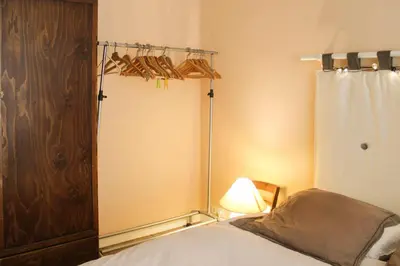 Un ou plusieurs lits dans un hébergement de l'établissement Cozy love nest near Stade de France