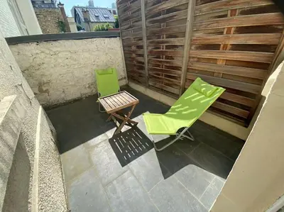 Coin salon dans l'établissement Maison charme 7 min Paris jardin