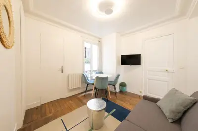 Télévision ou salle de divertissement dans l'établissement Mgic Apartment 4p Montmartre