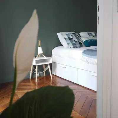 Un ou plusieurs lits dans un hébergement de l'établissement Appartement Haussmanannien Cosy - République