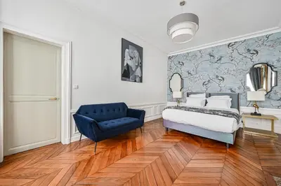 Un ou plusieurs lits dans un hébergement de l'établissement Appartement de luxe - Assemblée Nationale