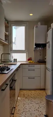 Cuisine ou kitchenette dans l'établissement Bel appartement 50 m2