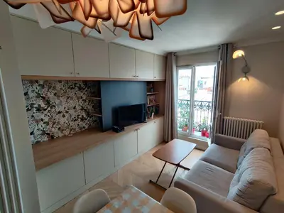 Télévision ou salle de divertissement dans l'établissement Bel appartement 50 m2