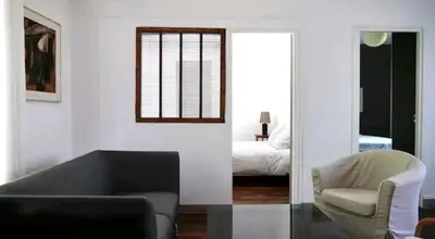 Un ou plusieurs lits dans un hébergement de l'établissement Une petite maison en ville