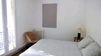 Un ou plusieurs lits dans un hébergement de l'établissement Une petite maison en ville