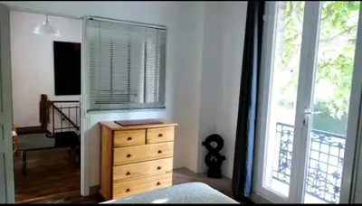 Un ou plusieurs lits dans un hébergement de l'établissement Une petite maison en ville