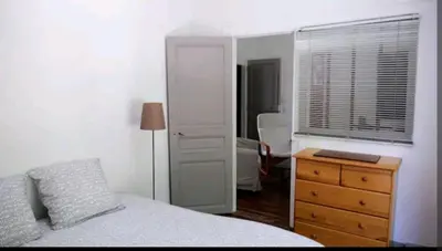 Un ou plusieurs lits dans un hébergement de l'établissement Une petite maison en ville