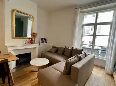 Coin salon dans l'établissement Cozy studio in center Paris (quartier Marais)