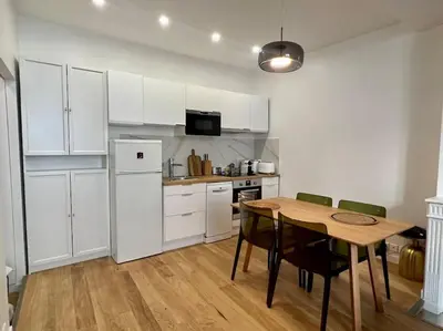 Cuisine ou kitchenette dans l'établissement Cozy studio in center Paris (quartier Marais)