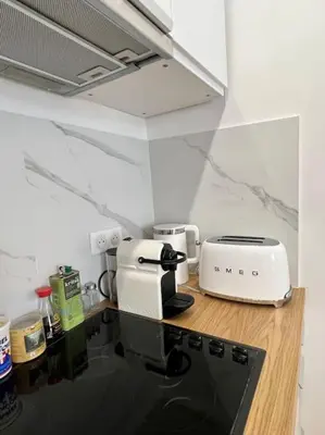 Cuisine ou kitchenette dans l'établissement Cozy studio in center Paris (quartier Marais)