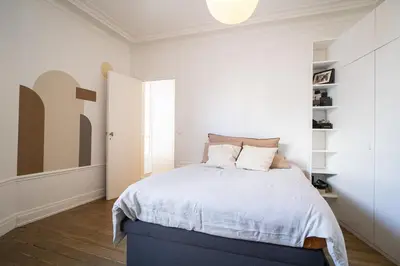 Un ou plusieurs lits dans un hébergement de l'établissement Spacious & bright cocoon