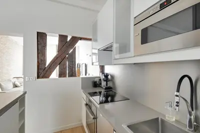 Cuisine ou kitchenette dans l'établissement Appartement Neuf Saint-Honoré - Tuileries