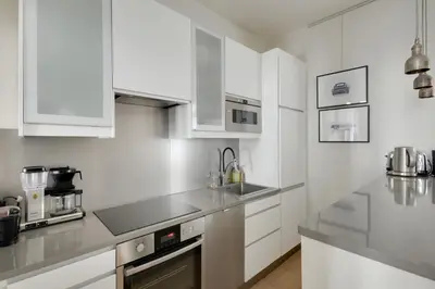 Cuisine ou kitchenette dans l'établissement Appartement Neuf Saint-Honoré - Tuileries