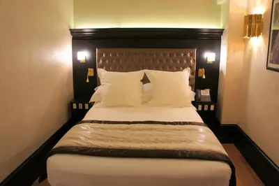 Un ou plusieurs lits dans un hébergement de l'établissement Tonic Hotel Saint Germain des Prés