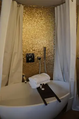 Un ou plusieurs lits dans un hébergement de l'établissement Tonic Hotel Saint Germain des Prés
