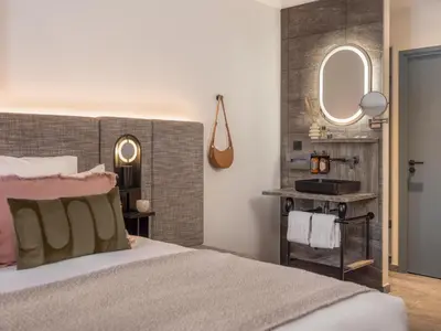 Un ou plusieurs lits dans un hébergement de l'établissement Boudoir des Muses