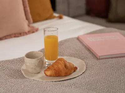 Options de petit-déjeuner proposées aux clients de l'établissement Boudoir des Muses