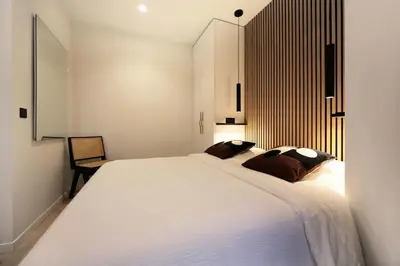 Un ou plusieurs lits dans un hébergement de l'établissement Appartement familiale sauna Paris 10 - 8P - FLAT-GUEST