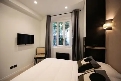 Un ou plusieurs lits dans un hébergement de l'établissement Appartement familiale sauna Paris 10 - 8P - FLAT-GUEST